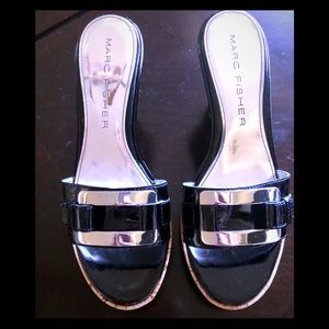 Black patent 4” wedge sandals.